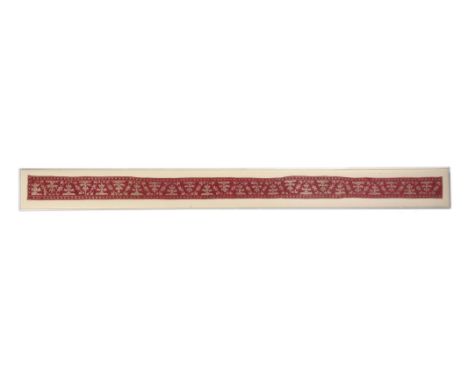 A Greek Islands embroidered panel Ionian Island, 18th century with stylised animals and symbols, 231cm x 12cm, mounted in a p
