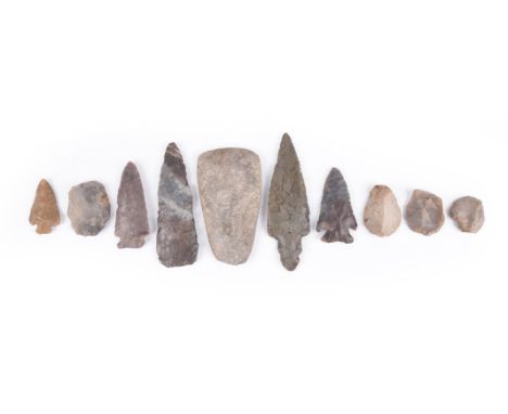 A group of nine flints Neolithic and laterincluding four spear / arrow heads, a knife and four small knives, inscribed ANTRIM