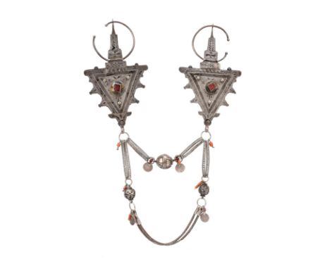 λA pair of Berber cloak fibulas tizerzai Morocco silver coloured metal with remains of enamel and with beads, chains and cora