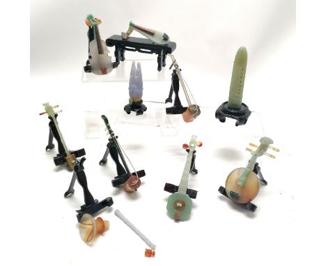 Set of 10 Oriental Chinese carved hardstone jade musical instruments with wooden stands in their original fitted box 29cm x 2