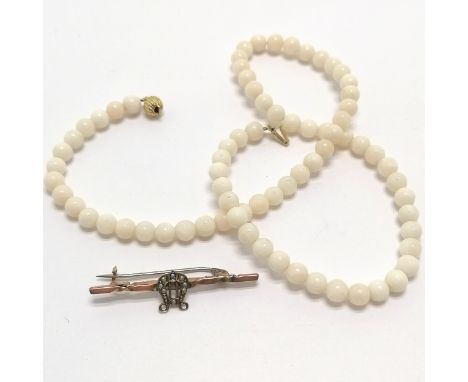 14ct gold clasp white coral bead necklace 40cm long T/W an antique 9ct gold marked bar brooch set with pearl and blue stone 