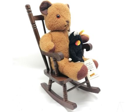 Steiff small black and white teddy toy with original label and tags 13cm long T/W  a teddy bear in a rocking chair 