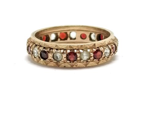 9ct hallmarked gold eternity ring set with garnets &amp; white stones - size N &amp; 2.3g total weight 