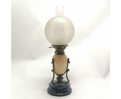Antique Art Nouveau oil lamp with a stoneware font in a stylised brass mount on a black ceramic base with Hinks no.2 Duplex b