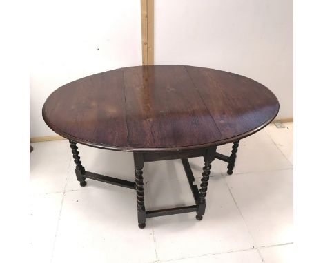 1930's oak drop flap gateleg table with barley twist supports, 106 cm wide, 147 cm length to include flaps, 73 cm high, in go