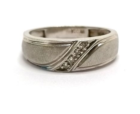 9ct hallmarked white gold diamond (4) set ring - size U &amp; 2.9g total weight ~ has slight dents 