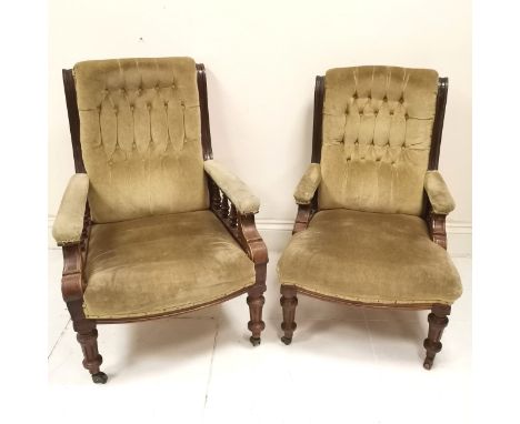 Pair of Antique mahogany framed button and scroll back Library chairs, upholstered in a light green velvet material, 1 with l
