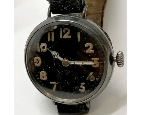 Silver cased c.WWI black dialled military style manual wind wristwatch (30mm case) - for spares / repairs (wound to top &amp;