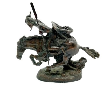 Bronze study of a native American Indian on horseback signed Reminton - 15cm high x 16.5cm across 