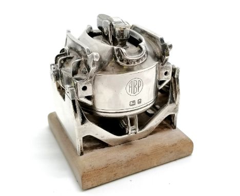 1959 silver novelty table lighter in the form of a crucible furnace (cast in 2 parts) by Richard Comyns on a wooden base (7cm