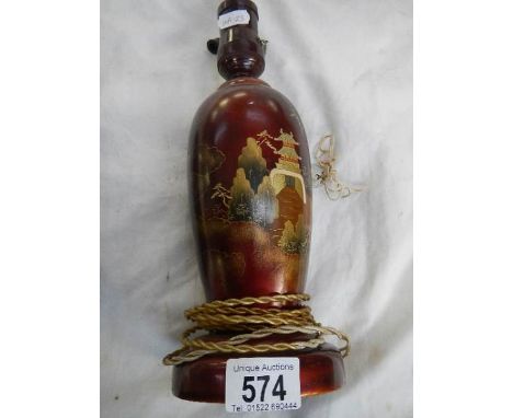 An early 20th-century lacquered table lamp base.