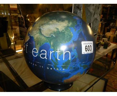 A BBC Earth "Planet Earth" globe, 21cm high.