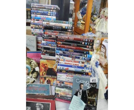 A large quantity of DVD's including box sets, Lord of the Rings, Disney, children's including Button Moon etc.