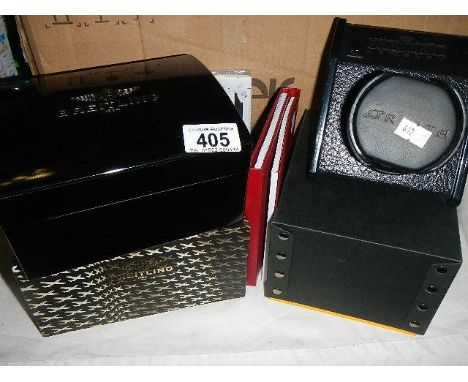 An Orbita battery powered automatic wrist watch winder, 2 Breitling and a Cartier empty boxes.
