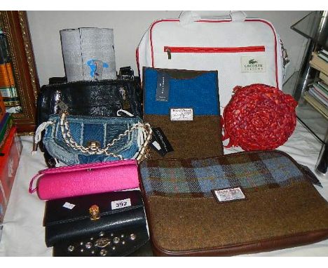 A mixed lot of ladies bags and purses including Harris Tweed, Lacoste, Harley Davidson etc.,