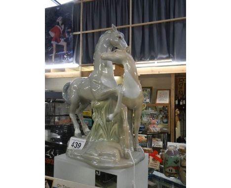 A ceramic mare with foal.*Condition report*No visible damage. Height 29cm. Made by Porcelanas Miquel Requena S.A