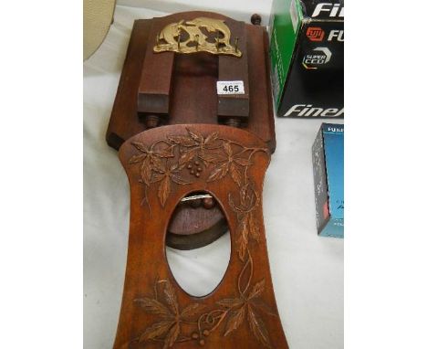 An art deco wooden photo frame and one other item.