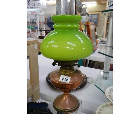 An old copper oil lamp.