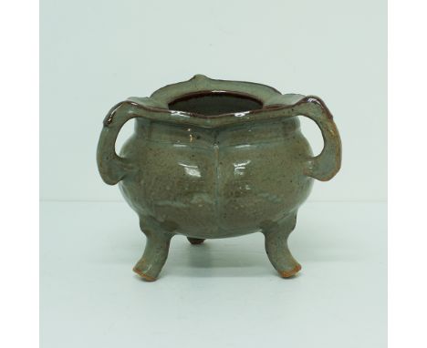 A ceramic three lobe footed bowl, celadon glazed with three handles marked "ENGLAND" H20cm, W25cm, c1970-80s.Provenance: Chri