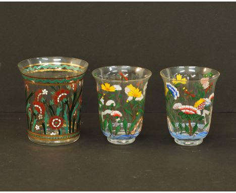 Three Gustav Schmoranz for Lobmeyr glass tumblers painted in enamels with Oriental flowers, the tallest H9.5cm, late 19th / e