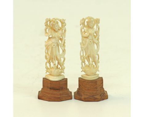 Two Anglo Indian ivory carvings of Hindu Deities, attached on wooden plinths, H10cm, early 20th century. (2)Provenance: From 