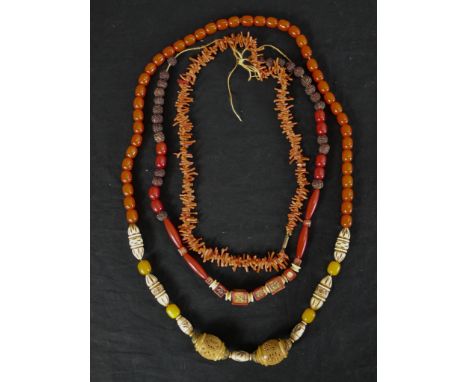Two vintage Bakelite necklaces and a branch coral necklace  H.2 W.47 D.3cm (largest) 