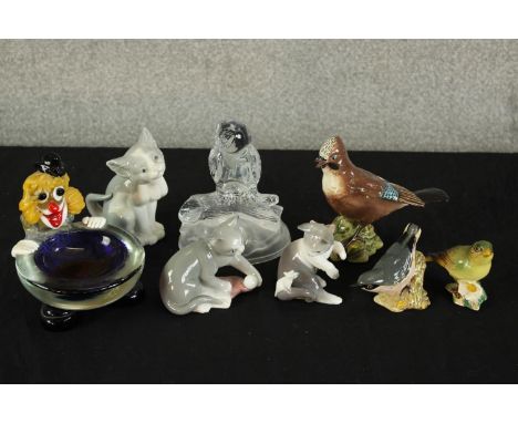 Three Beswick porcelain birds to include Nut Hatch and Greenfinch together with two Lladro porcelain seated cats and a Nao po