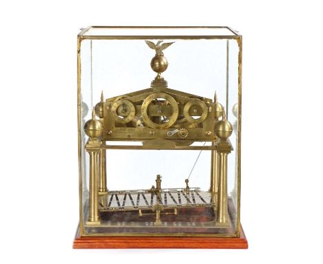 Mid 20th Congreve rolling ball block by Paul Lester, the brass eagle finial above a central minutes chapter ring and flanked 