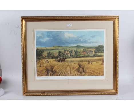 Alan Fearnley Signed Limited Edition print depicting the harvest housed within a gilt and glazed frame 76cm by 62cm