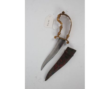 19th Century Indian bichwa dagger, the pierced brass handle above a swept blade and fabric mounted scabbard, 25cm long