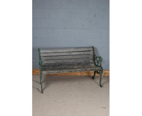 Garden bench, the scrolled ends with lion mask terminals, with slatted wooden seat, 128cm wide