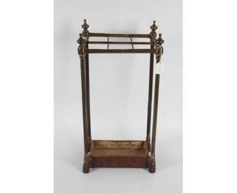 Late Victorian brass walking stick stand, the sloping top with six divisions above a drip pan to the base, 3.5cm wide, 62cm h