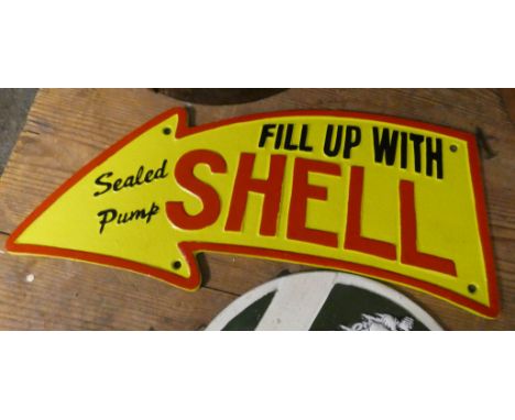 A 'Fill Up with Shell' arrow wall plaque 