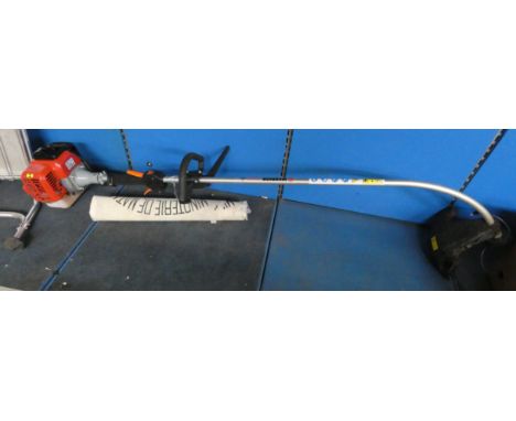 A Warrior petrol engine strimmer 