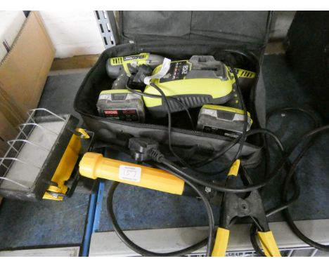 Ryobi 2 drill set with charger - working - one battery defective and a clip on electric lamp