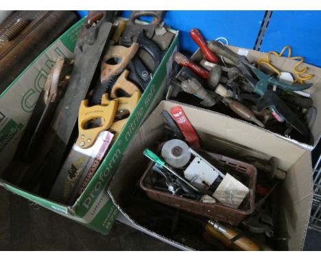 Large box of saws and various hand tools