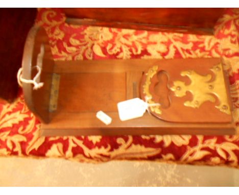 A vintage Betjeman's book slide with ornate brass fittings