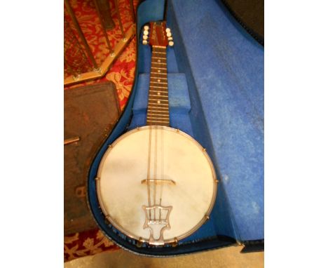 A vintage 1930's John Grey & Sons banjo in case for restoration 
