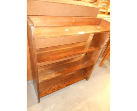 A mid-20th C oak four shelf waterfall bookcase, 91cm high x 77cm width x 22cm deep