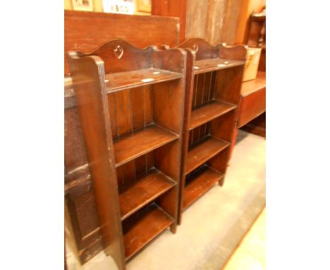 Two mid-20th C oak four shelf bookcases each with floral pierced galleries and fluted supports, 104cm high x 54cm wide x 19cm