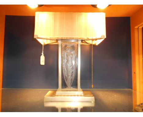 A French Heitier Vincent art deco lamp having moulded frosted glass shade, resting on a chrome base with etched glass art nou