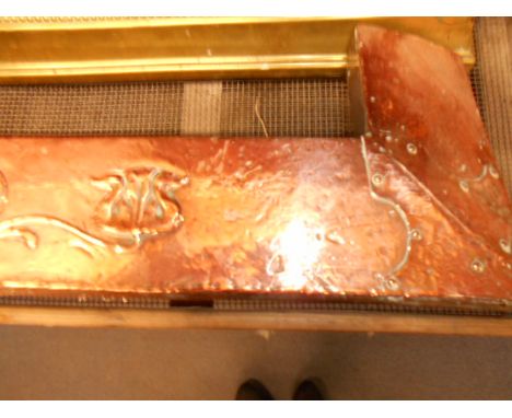 A 19th C hammered Art Nouveau fender with embossed tulip decoration 142cm wide x 23cm deep