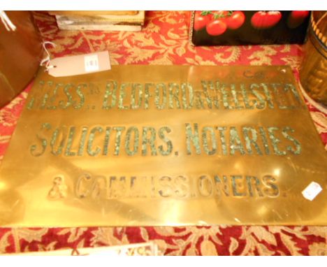 A vintage brass plaque for 'Messrs. Bedford & Wellsted Solicitors, Notaries & Commissioners'