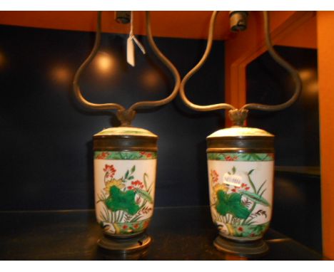 A pair of Chinese ceramic and metal table lamps with floral decoration 