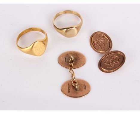 A 22ct gold signet ring 6.4g, a 9ct gold signet ring 3.9g and a pair of 9ct gold cufflinks 6.4g