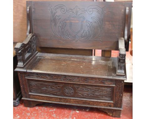 An oak monks bench, coffer, two occasional tables and a stool