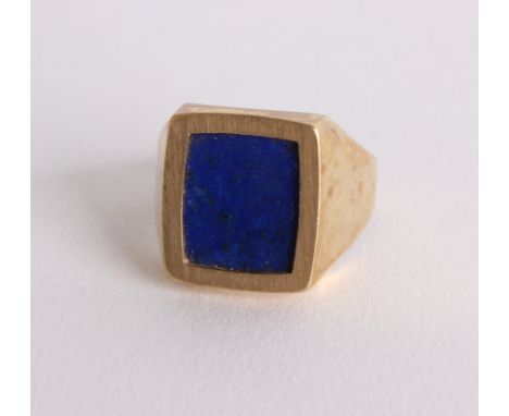 A 9ct gold and lapis lazuli signet ring, in rectangular bezel setting, 8.3g in total Ring size R approx. 