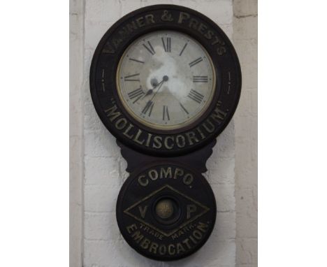 A BAIRD CLOCK CO. PLATTSBURGH USA advertising drop dial wall clock 'VANNER & PREST'S MOLLISCORIUM ', with Roman numeral dial 