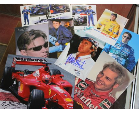 Formula One signed photographs To include Jenson Button, Jackie Stewart, George Bignotti, Jarno Trulli, Ricardo Zonita (19)