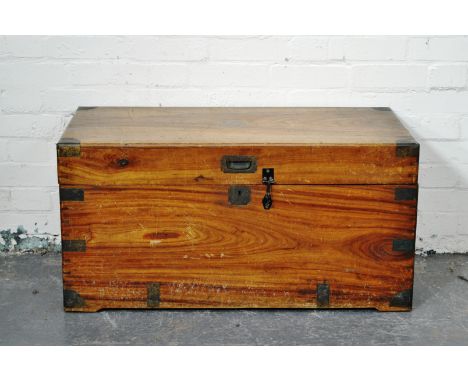 Victorian teak trunk, rectangular hinged top, brass mounts and recessed handle, brass carrying handle to the sides, width 94c